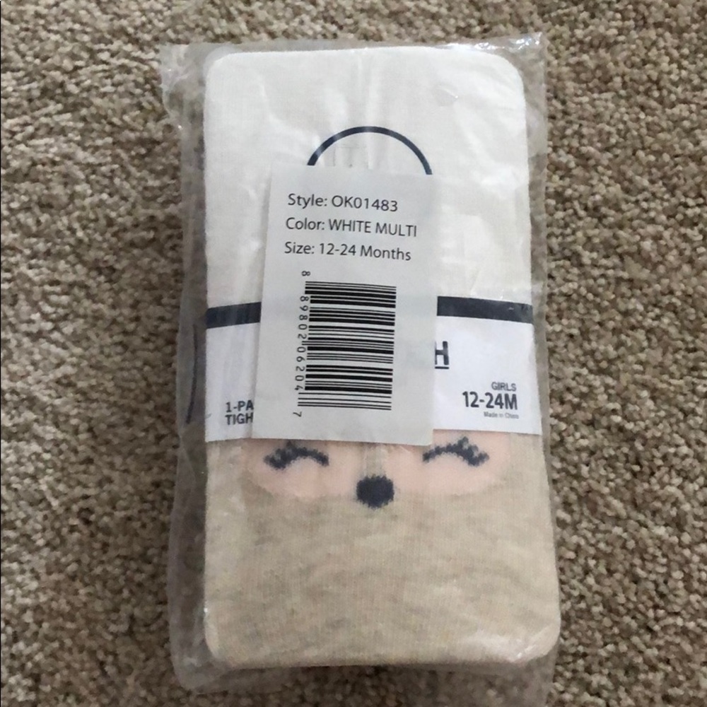 Animal and white tights NEW IN BAG
